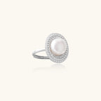 Sterling silver ring with 9mm freshwater pearl center surrounded by double halo of sparkling crystals