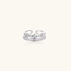 Adjustable gold-plated crown ring with zirconia crystals in ornate tiara design on white background.