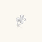 18K gold plated brass ring with intricate feather design forming a heart shape on white background.