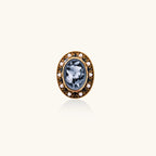 Oval cameo ring with blue-grey floral design surrounded by white shell pearls in gold-plated brass setting